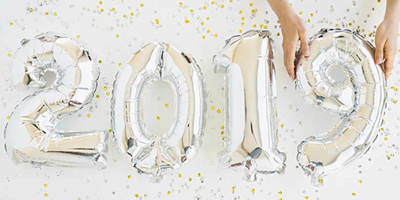 Silver number balloons spelling out 2019