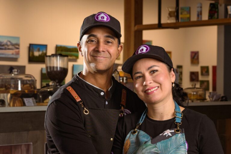 Martha and Luis inside La Casita Coffee in Cochrane.