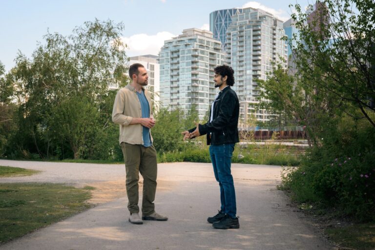Michael Snow of Snow Psychology speaking with a client in downtown Calgary, Alberta.